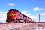 ATSF 638-BNSF 1058-ATSF 902, west bound leaving the yard at West Winslow, Arizona. April 12, 1998. 